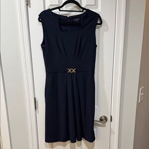 Gorgeous Navy dress with gold waist chain detail